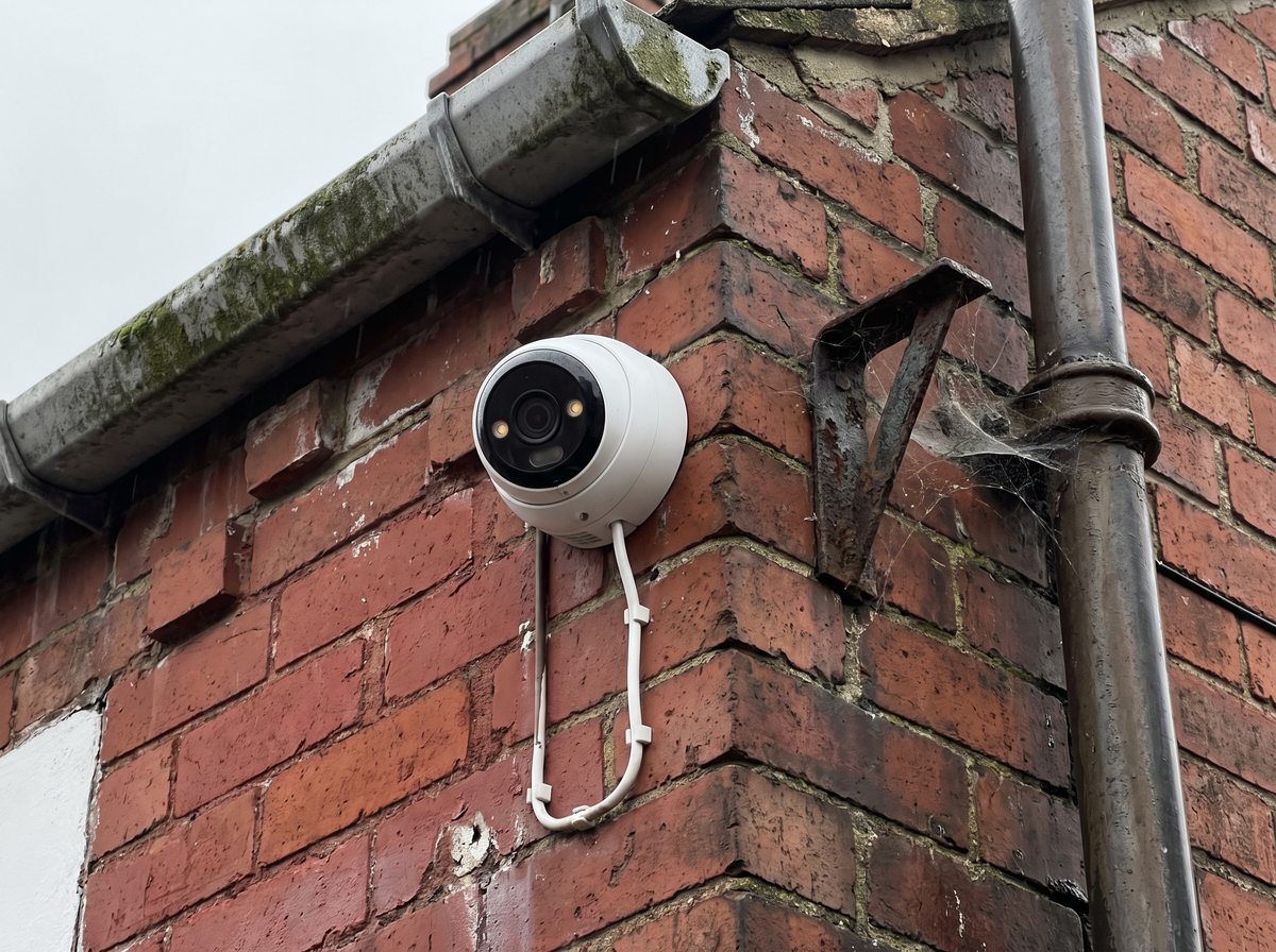 Turret camera on the corner brickwork of a Victorian terraced house